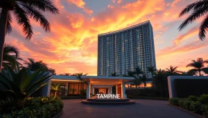 Showcase of the modern tampines ec Executive Condominium entrance with lush landscaping.